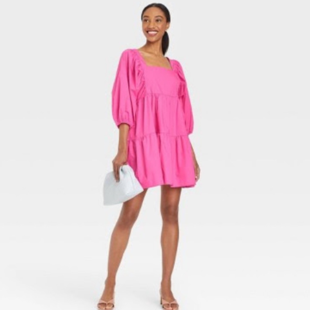 Vibrant Pink Dress with Puff Sleeves
A new day from target. 
New with tags!